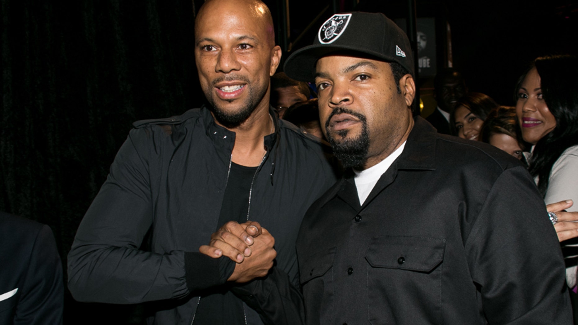 Common, left, and Ice Cube attend the Los Angeles premiere of "Straight Outta Compton" after party at the L.A. Live Event Deck on Monday, Aug. 10, 2015.