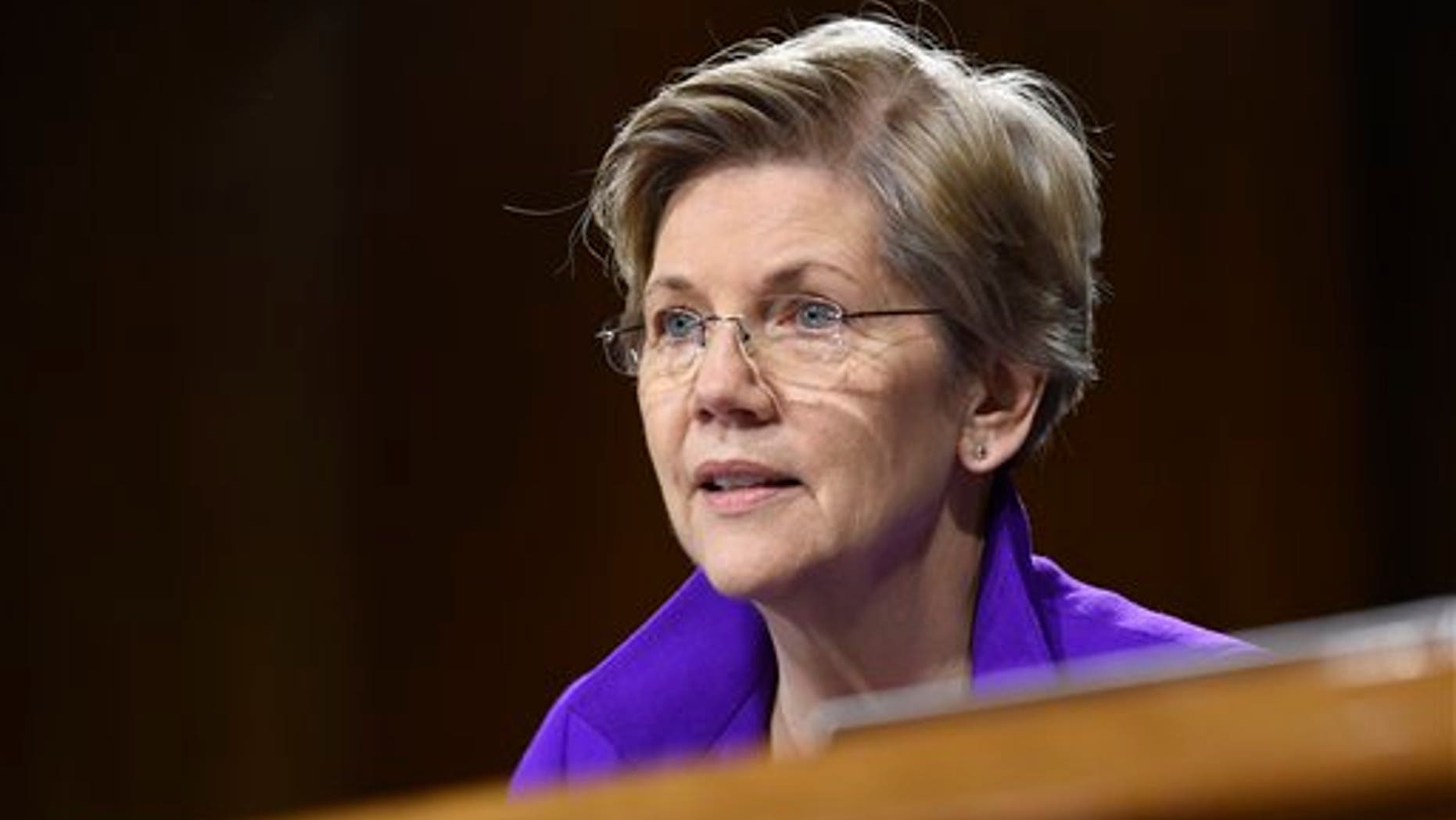 FILE - In this Feb. 24, 2015, file photo, Sen. Elizabeth Warren, D-Mass., is seen on Capitol Hill in Washington. (AP Photo/Susan Walsh, File)