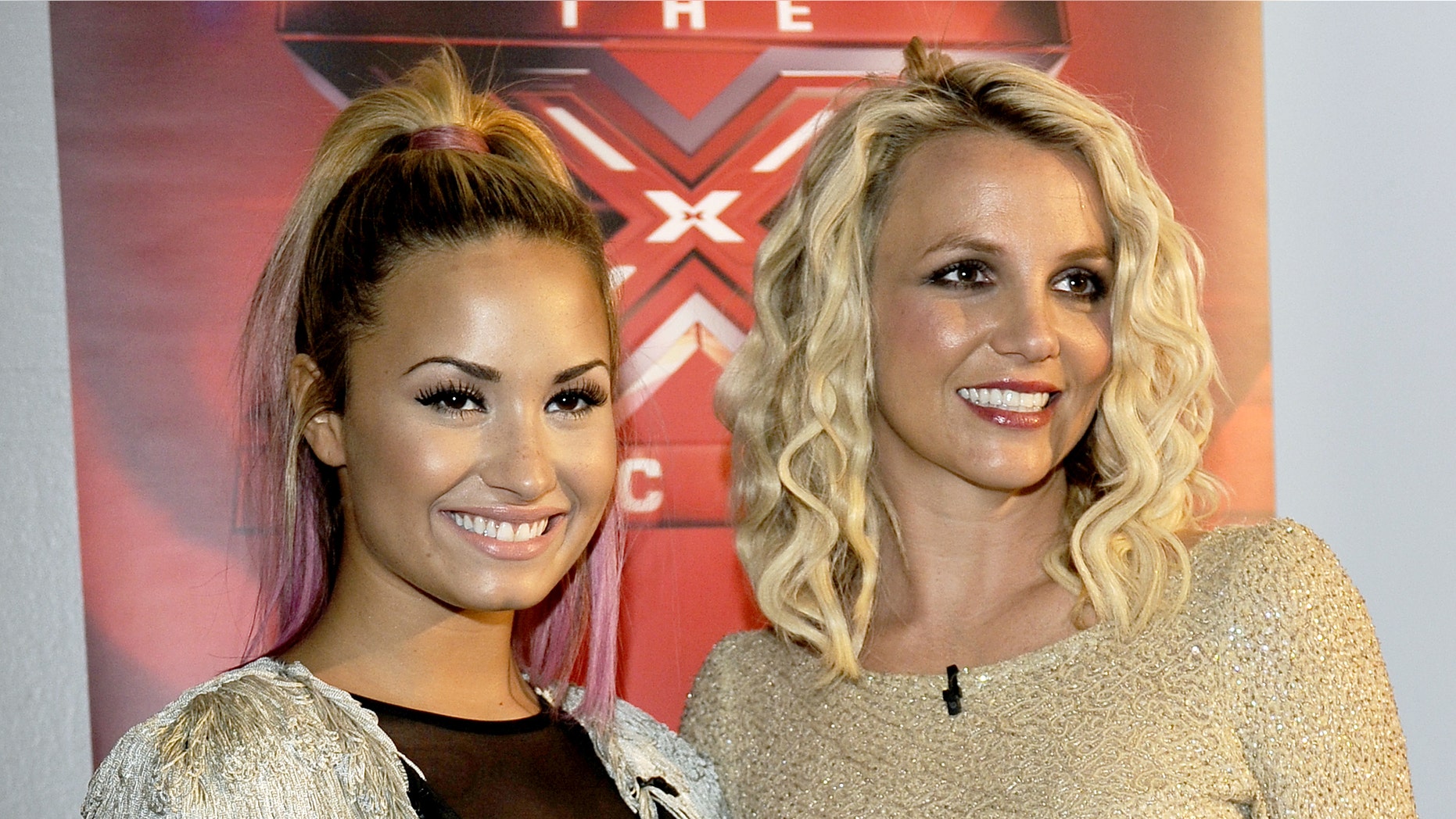 OAKLAND, CA - JUNE 16: Demi Lovato (L) and Britney Spears attend Fox's "The X Factor" Season 2 Auditions at Oracle Arena on June 16, 2012 in Oakland, California. (Photo by Tim Mosenfelder/Getty Images)