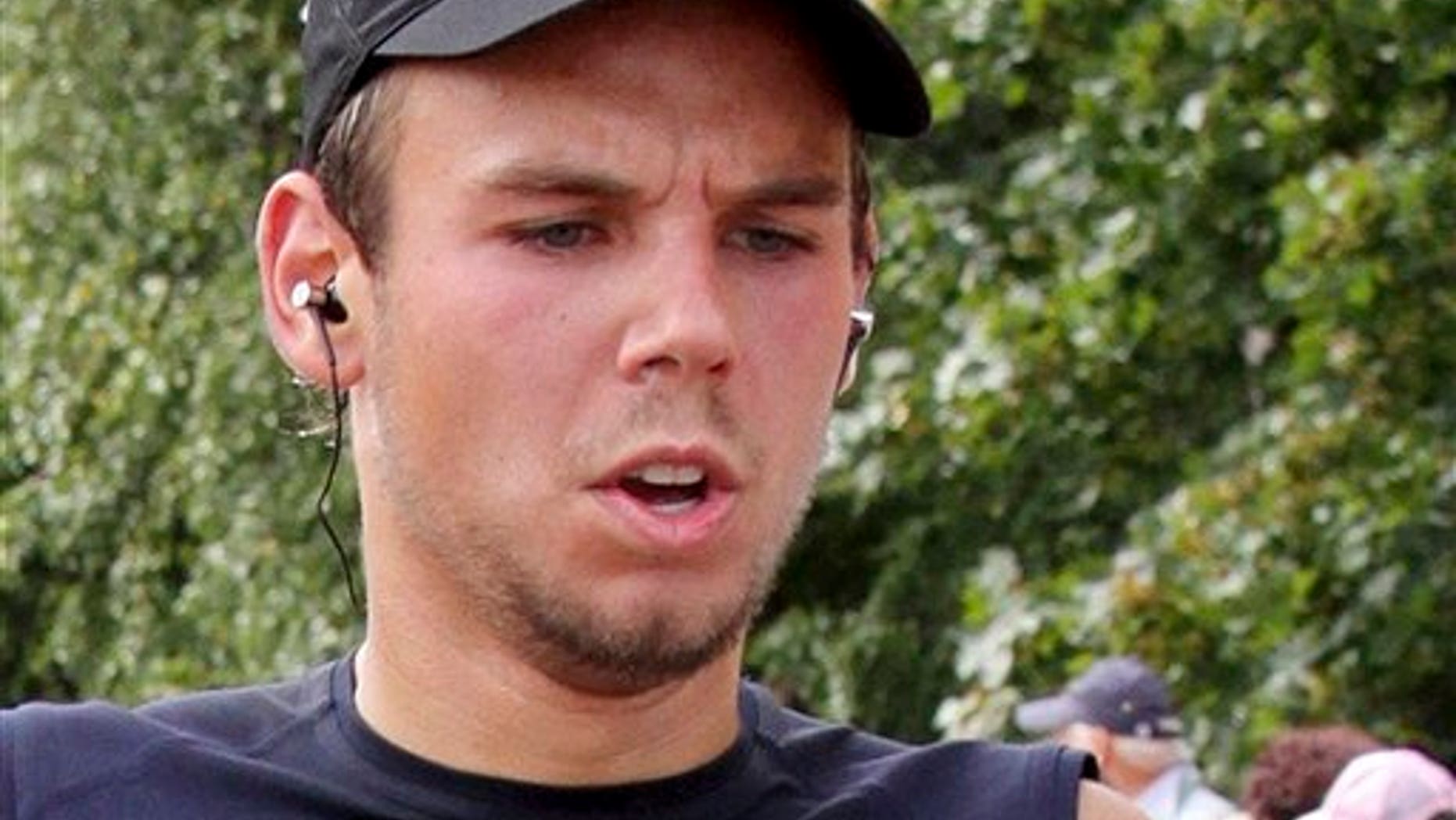 In this Sept. 13, 2009, photo, Germanwings co-pilot Andreas Lubitz competes at the Airportrun in Hamburg, northern Germany. (AP Photo/Michael Mueller)