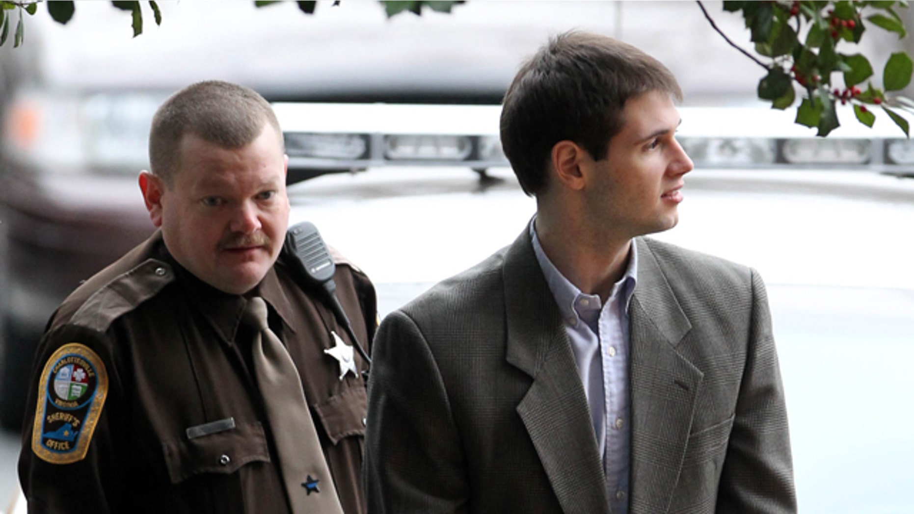 Feb. 14: George Huguely is escorted to court.