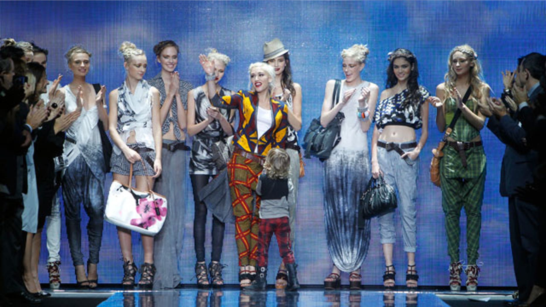 Sept. 16: Designer Gwen Stefani acknowledges the audience after the L.A.M.B. spring 2011 collection show.