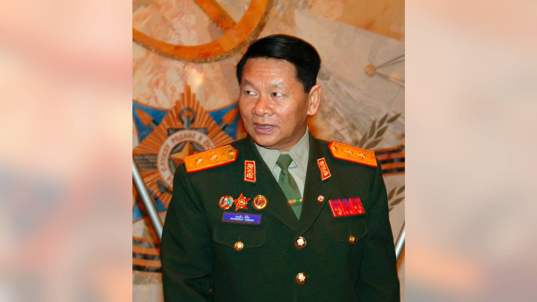 FILE - Laotian Defense Minister, Douangchay Phichit, is seen during a visit to Moscow in this Tuesday, April 27, 2004 file photo. A Laos air force plane believed to be carrying 20 people including the country's defense minister crashed on Saturday May 17, 2014, Thailand's Foreign Ministry said. (AP Photo/File)