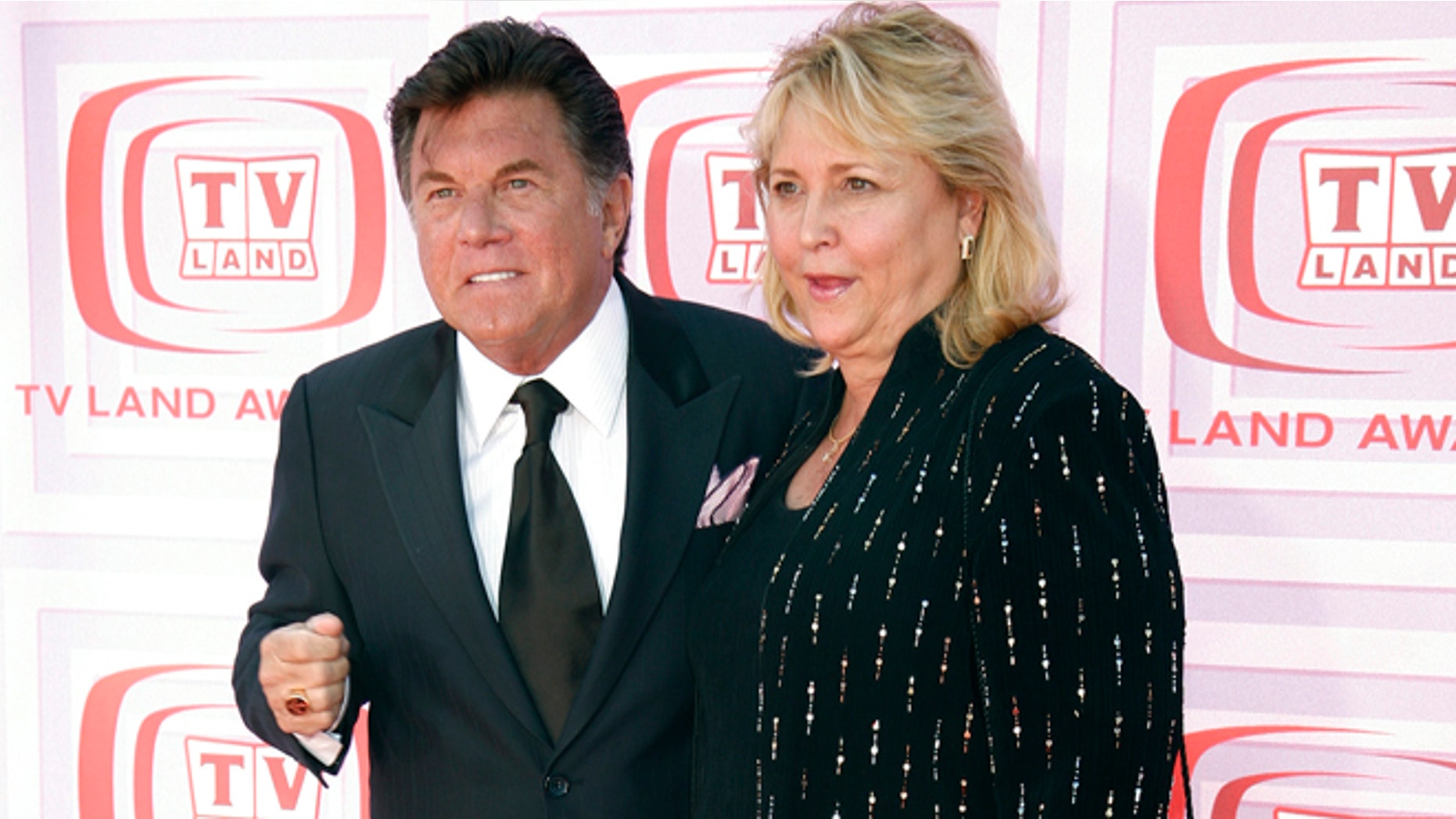 Actor Larry Manetti, left, of "Magnum, P.I." arrives at the TV Land Awards in Los Angeles, California, April 19, 2009.