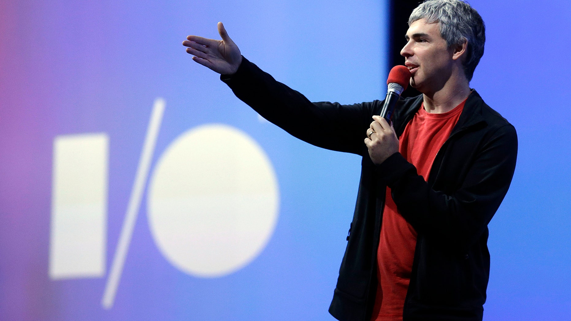 Larry Page, Google's co-founder and chief executive, speaks during the keynote presentation at Google I/O 2013 in San Francisco, Wednesday, May 15, 2013. (AP Photo/Jeff Chiu)