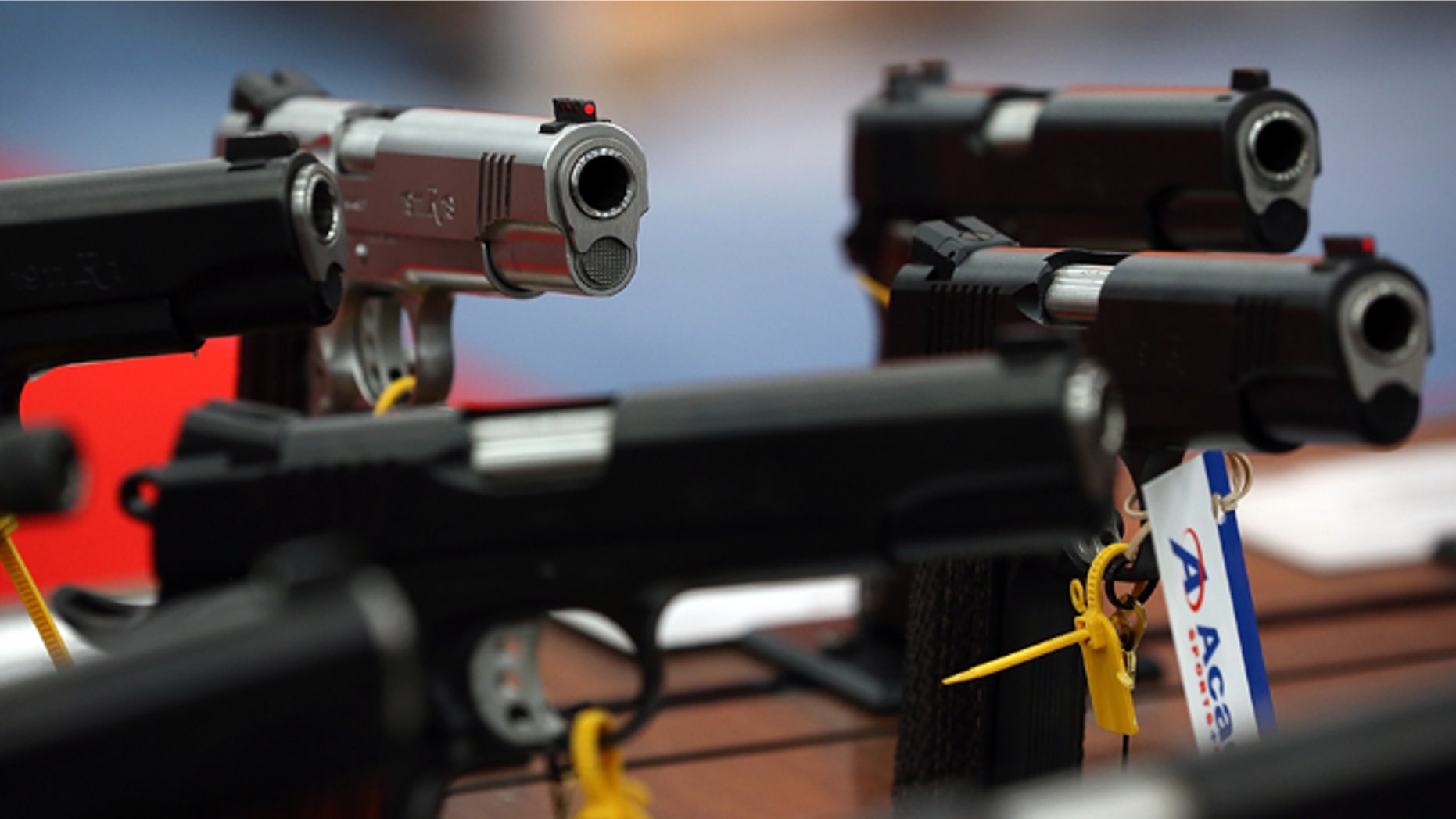 HOUSTON, TX - MAY 05: Handguns are displayed in the Remington booth during the 2013 NRA Annual Meeting and Exhibits at the George R. Brown Convention Center on May 5, 2013 in Houston, Texas. More than 70,000 people attended the NRA's 3-day annual meeting that featured nearly 550 exhibitors, a gun trade show and a political rally. (Photo by Justin Sullivan/Getty Images)