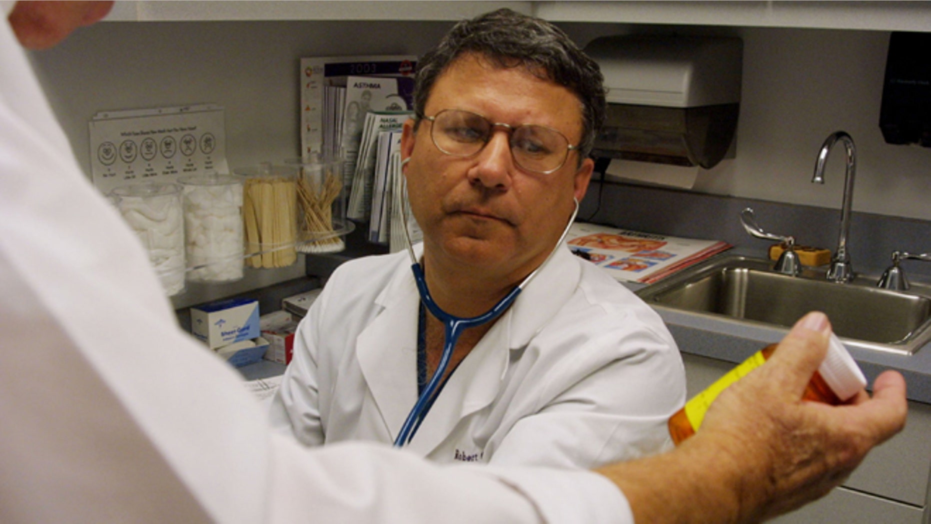 Dr. Robert Hernandez, a practicing doctor at the Christus Coushatta Rural Health Center in the Red River parish, Louisiana, November 11, 2003. (Photo by Mario Villafuerte/Getty Images)