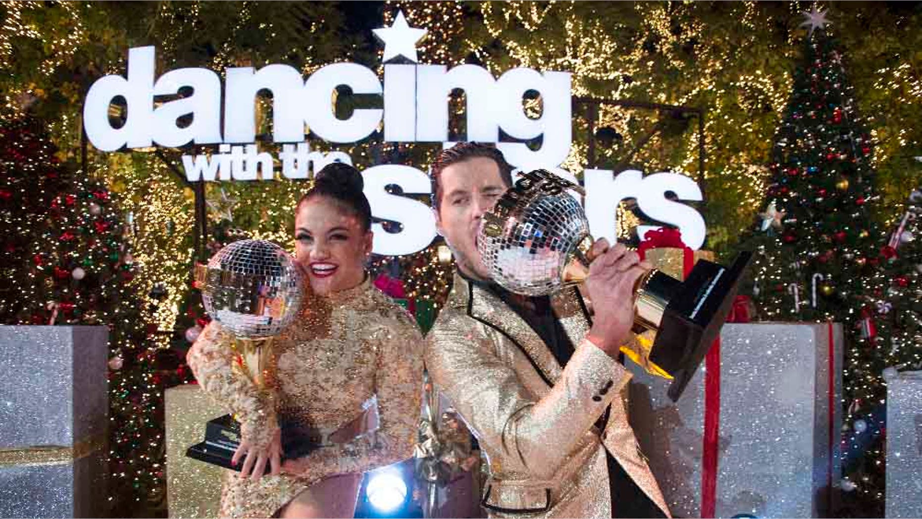 Laurie Hernandez and Val Chmerkovskiy celebrate after winning the 23rd season of 'Dancing With The Stars.'