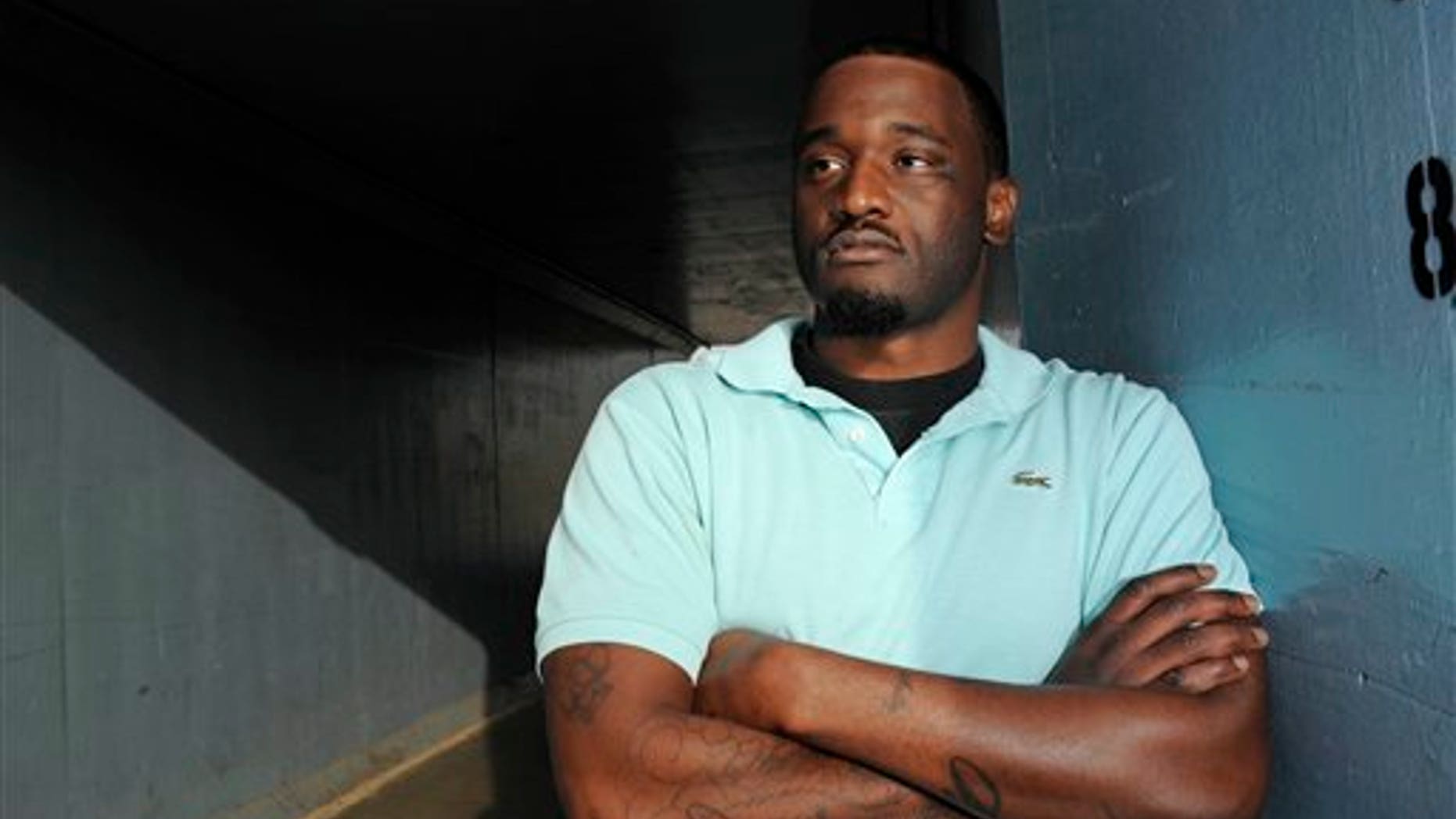 Feb. 1: Marine Corps Pvt. Lazzaric Caldwell poses for a photo in Oceanside, Calif. Caldwell, a Marine Corps private who cut his wrists in an undisputed suicide attempt, is fighting his conviction for intentional self-injury, a military charge often used to prosecute service members who try to shirk their duties.