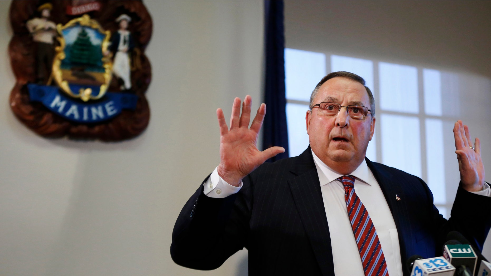 FILE- In this Jan. 8, 2016, file photo, Maine Gov. Paul LePage speaks at a news conference at the State House in Augusta, Maine. LePage told reporters Wednesday, Jan. 27, that Mainers are allowed to carry concealed handguns. (AP Photo/Robert F. Bukaty, File)