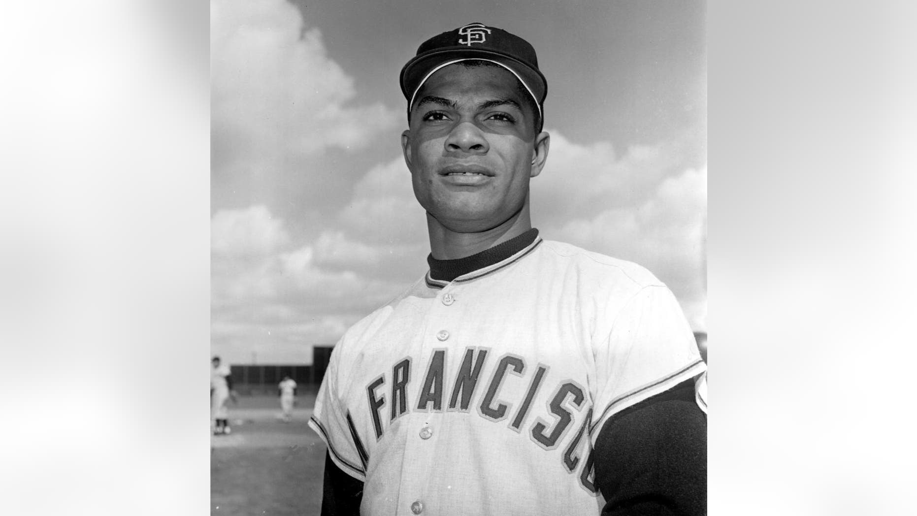 In this March 8, 1962 file photo Felipe Alou, outfielder for the San Francisco Giants, poses in Casa Grande, Ariz. Alou and Orlando Cepeda were dark-skinned Latinos who knew little English when they arrived in the minor leagues as teenagers, among the first wave of Spanish-speaking players thrown into a new culture to play professional baseball. Both are encouraged to see so many young players from Latin America now arriving in the U.S. with better English skills, thanks in large part to all 30 major league organizations putting more emphasis into such training through academies in the Dominican Republic and Venezuela. (AP Photo/File)