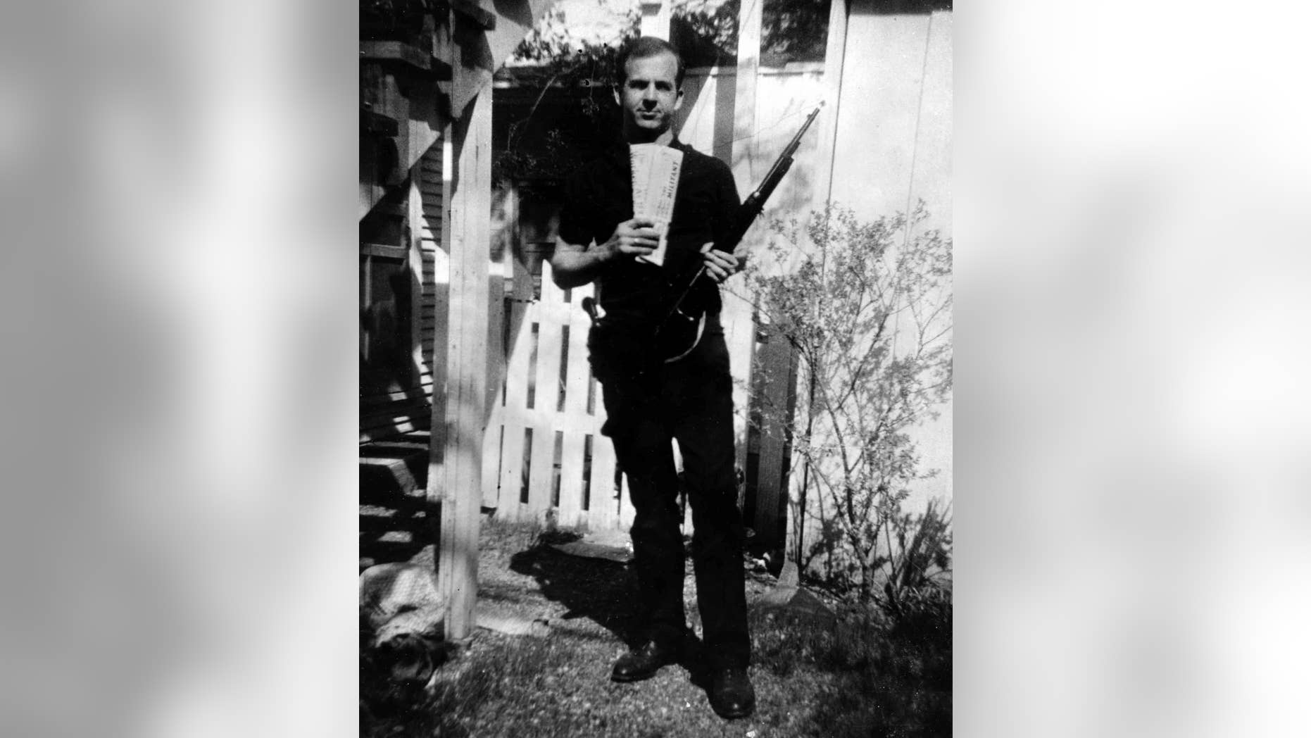 The famous backyard photo of Lee Harvey Oswald.
