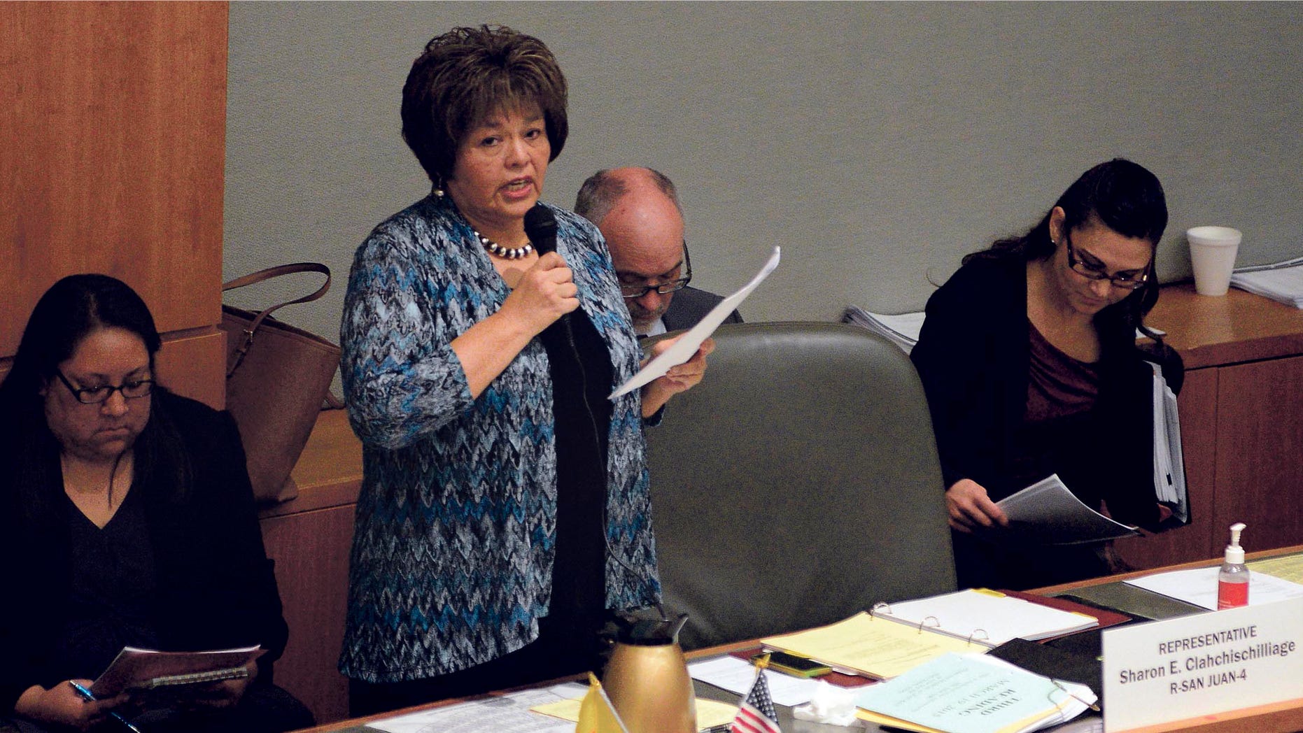 FILE - In this March 19, 2015 file photo, Rep. Sharon Clahchischilliage, R-Kirtland, speaks on the floor of the New Mexico house in Santa Fe, N.M. Officials said this week Rep. Alonzo Baldonado, of Los Lunas, and Clahchischilliage will join the Republican State Leadership Committee's "Future Majority Project." (Clyde Mueller/Santa Fe New Mexican via AP)