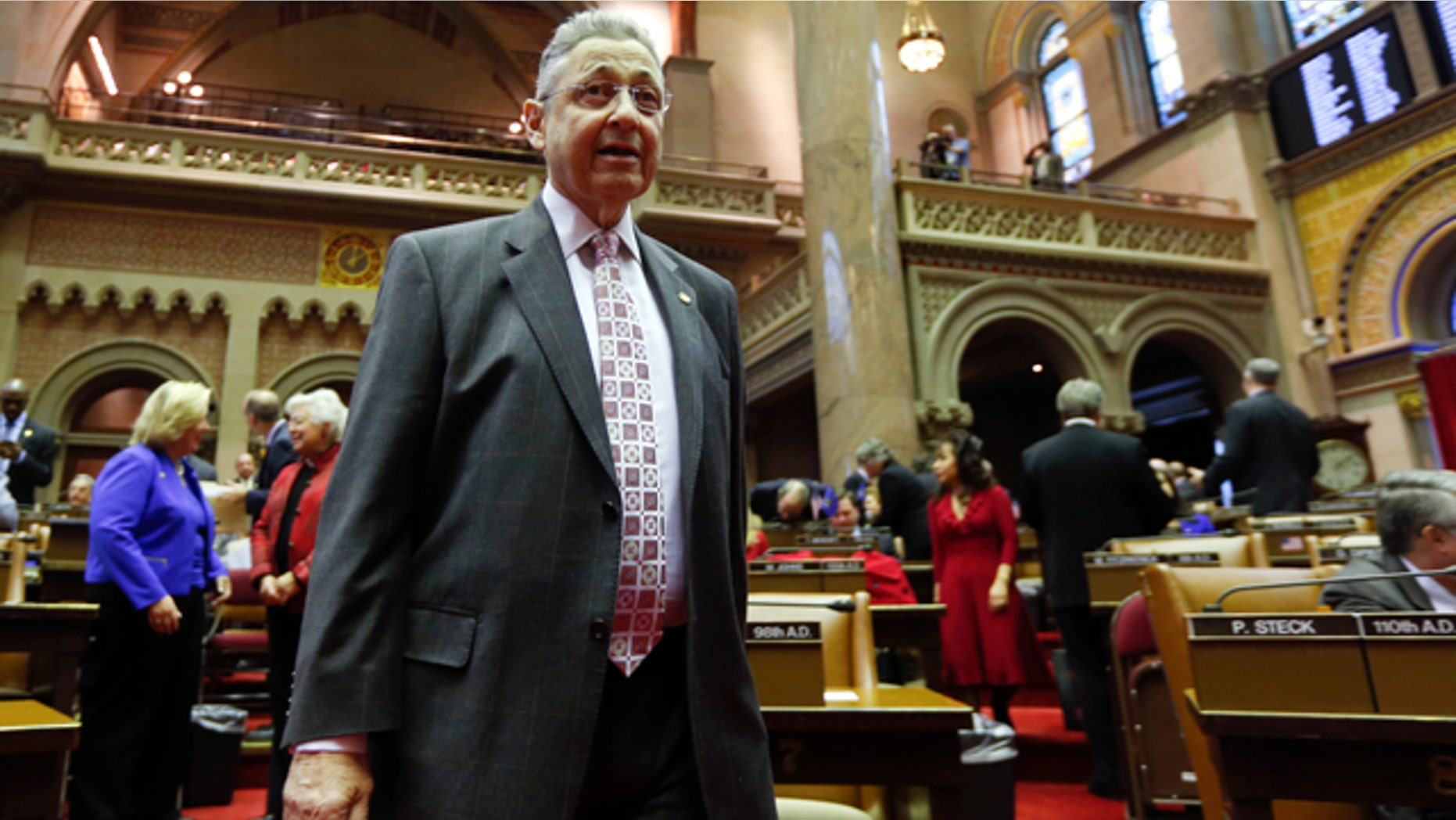 Jan. 7, 2015: Assembly Speaker Sheldon Silver, D-Manhattan, walks on the floor in the Assembly Chamber at the start of the 2015 legislative session at the state Capitol in Albany, N.Y. (AP Photo/Mike Groll)