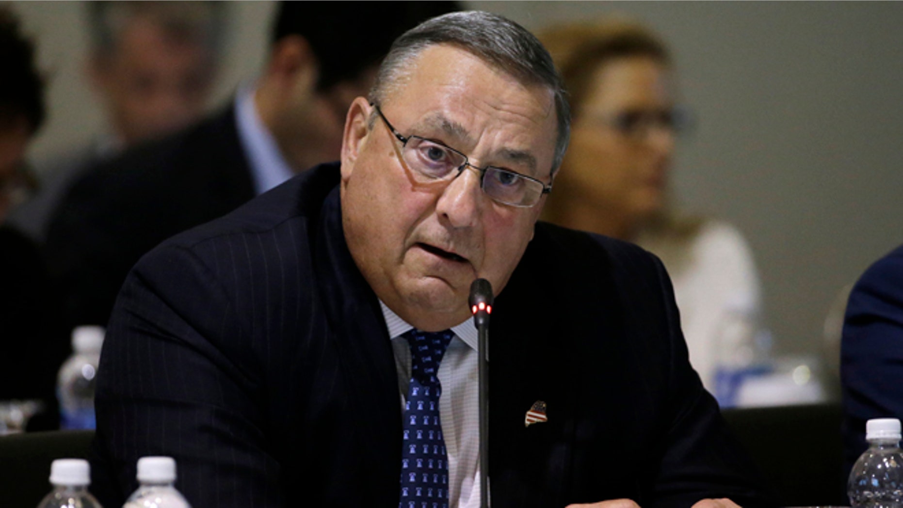 FILE - In this Aug. 29, 2016 file photo, Maine Gov. Paul LePage speaks during a conference of New England's governors and eastern Canada's premiers to discuss closer regional collaboration, in Boston. Maineââ¬â¢s Democratic Secretary of State Matt Dunlap says LePageââ¬â¢s recent behavior has caused outrage but that doesnââ¬â¢t mean he canââ¬â¢t keep performing as governor. Critics want to punish LePage for an obscenity-laden voicemail and threats directed at a legislator. (AP Photo/Elise Amendola, File)