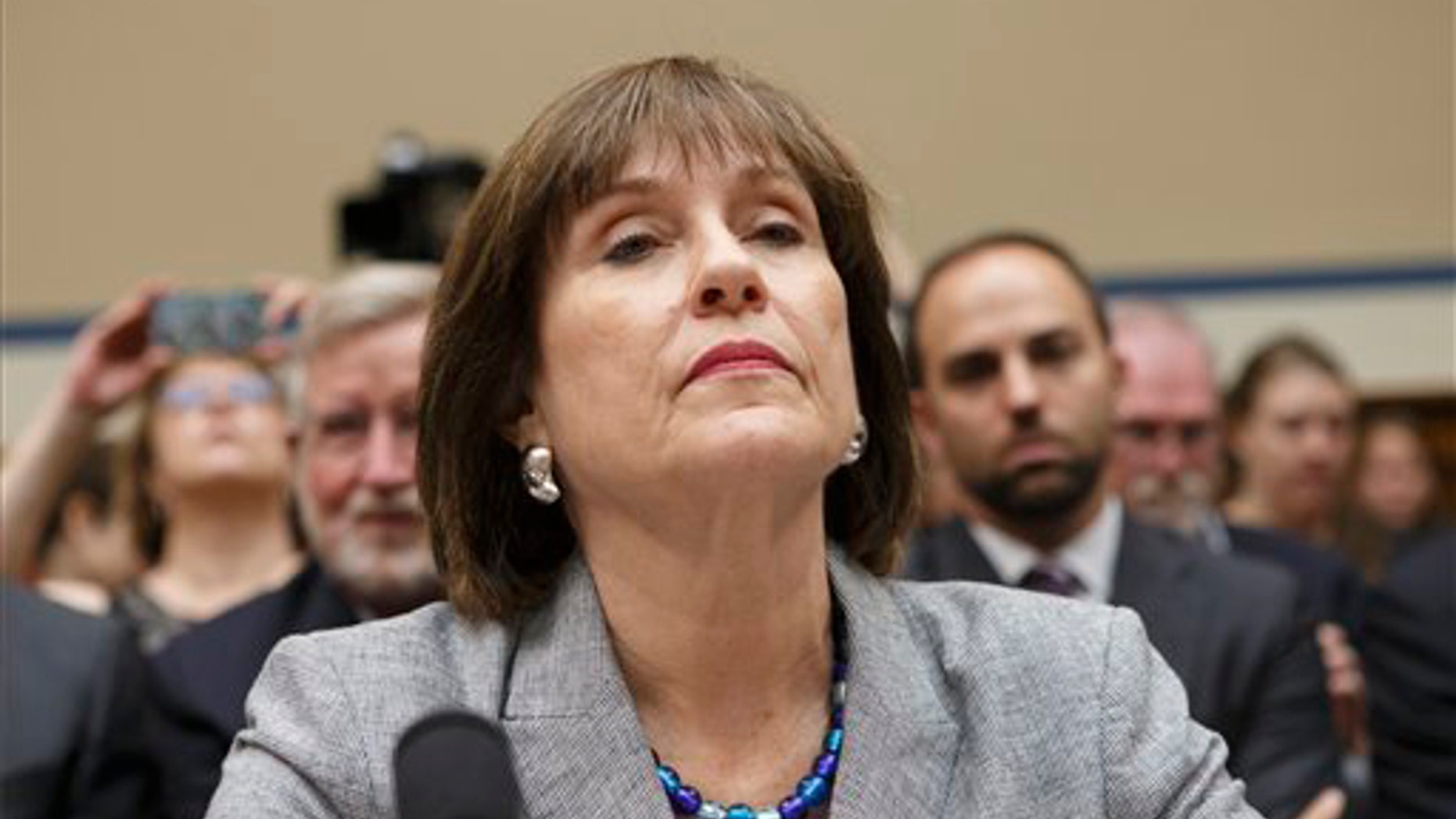 FILE - This May 22, 2013 file photo shows Internal Revenue Service (IRS) official Lois Lerner on Capitol Hill in Washington. The IRS says it has lost a trove of emails to and from a central figure in the agency's tea party controversy. The IRS told congressional investigators Friday it cannot locate many of Lois Lerner's emails prior to 2011 because her computer crashed that year. Lerner headed the IRS division that processed applications for tax-exempt status. The IRS acknowledged last year that agents had improperly scrutinized applications for tax-exempt status by tea party and other conservative groups. The IRS was able to generate 24,000 Lerner emails from 2009 to 2011 because Lerner had copied in other IRS employees. But an untold number are gone. (AP Photo/J. Scott Applewhite, File)