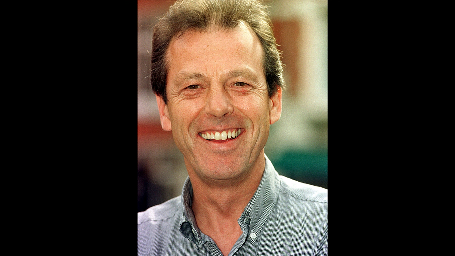 This Sept. 11, 1997 file photo shows actor Leslie Grantham in London. Leslie Grantham, who played arch-villain "Dirty Den" Watts on British soap opera "EastEnders," has died at the age of 71. Grantham's management, Advocate Agency, says he died Friday, June 15, 2018 but did not disclose the cause of death.