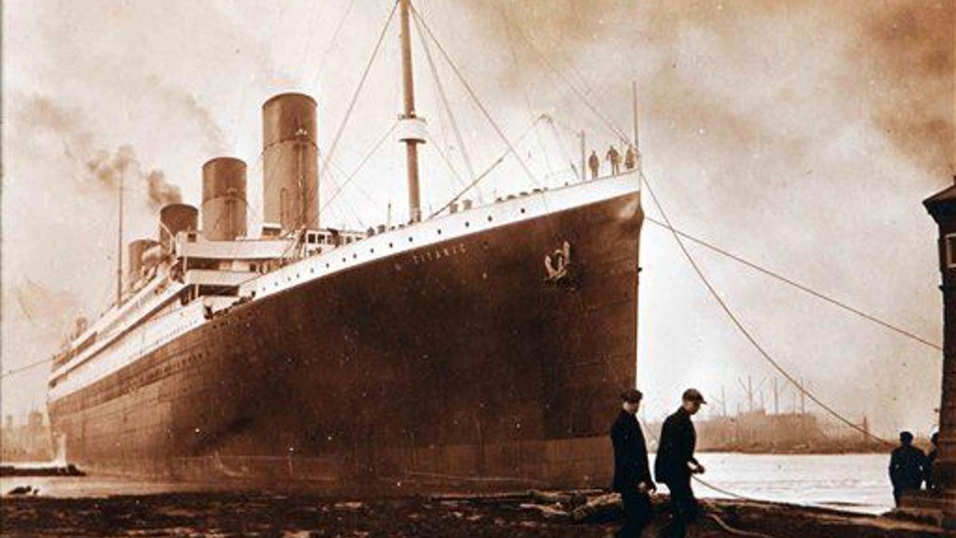 This image made available by the Ulster Folk & Transport Museum on Tuesday, Oct. 14, 2014, is a photograph of the Titanic in Belfast in a family album.