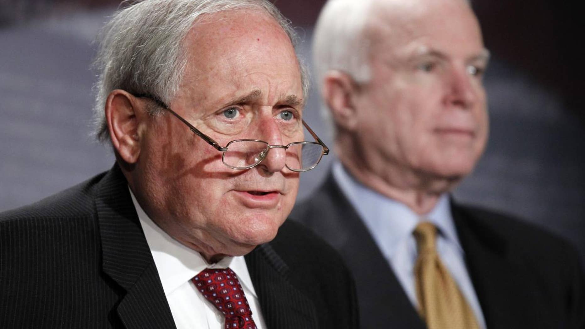 Sen. Carl Levin, D-Mich., left, and Sen. John McCain, R-Ariz., talk to the media about the Chinese government's failure to cooperate in an ongoing Senate Armed Services Committee investigation into counterfeit parts in the Department of Defense supply chain, on Capitol Hill Tuesday, June 14, 2011 in Washington.(AP Photo/Alex Brandon)