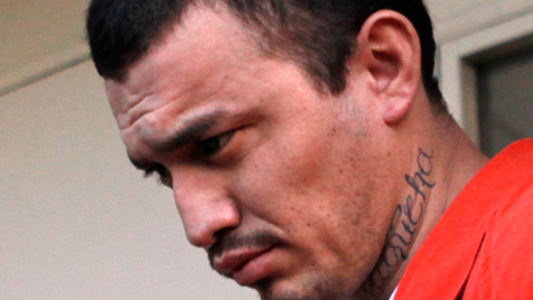 In this April 22, 2009 file photo, Ingmar Guandique, 27, is escorted from the Violent Crimes Unit by police in Washington. (AP)