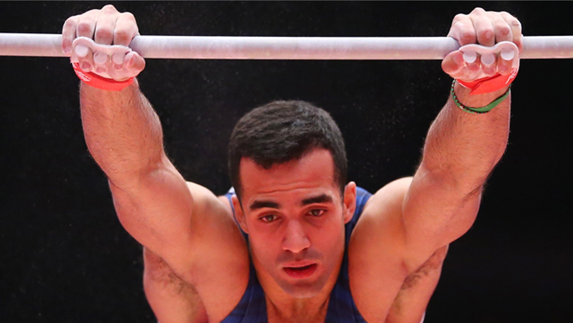 GLASGOW, SCOTLAND - OCTOBER 26: Danell Levya of United States competes on the High Bars during day four of World Artistic Gymnastics Championships at The SSE Hydro on October 26, 2015 in Glasgow, Scotland. (Photo by Ian MacNicol/Getty images)