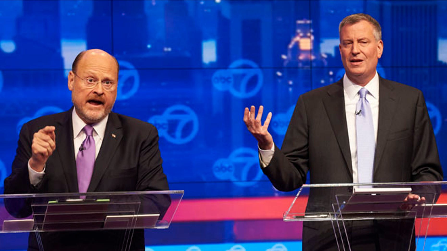 Oct. 15, 2013: New York City Republican mayoral candidate Joe Lhota, left, and Democratic mayoral candidate Bill de Blasio, participate in their first televised debate at WABC/Channel 7 studios in New York.