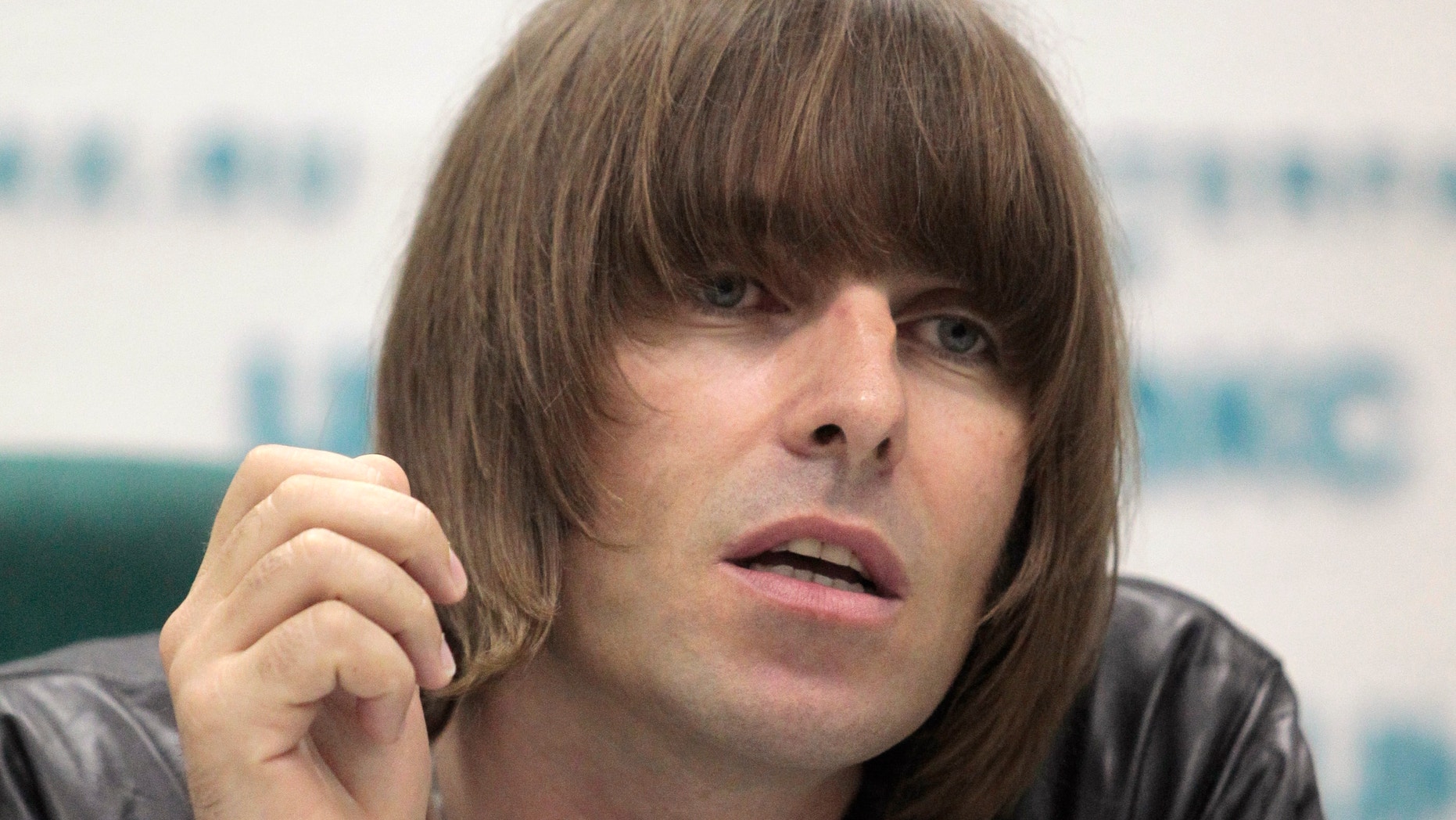 Former Oasis front man Liam Gallagher answers a question during a news conference in Moscow June 3, 2011.