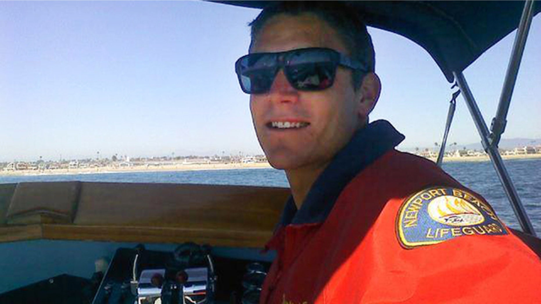 This undated photo provided by the Newport Beach Police Department shows Ben Carlson, 32, a Newport Beach lifeguard who drowned while trying to rescue a swimmer off the Southern California beach on Sunday, July 6, 2014. (AP/Newport Beach Police Department)