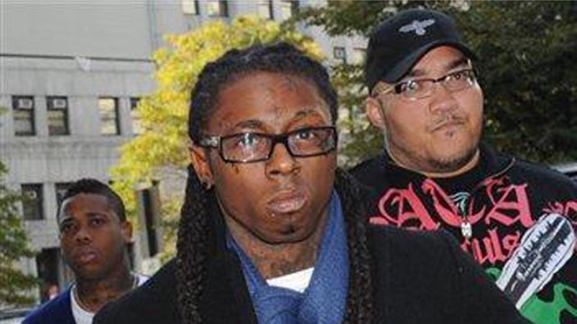 Oct. 21, 2009: Rapper Lil Wayne enters Manhattan criminal court in New York.