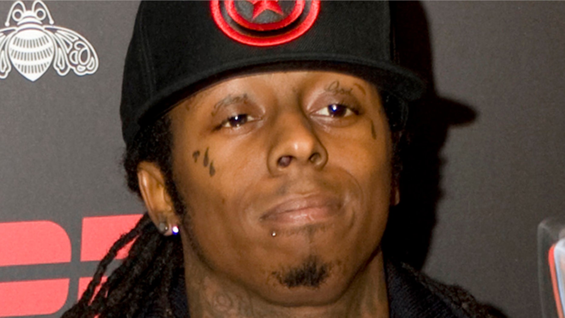 Jan. 30, 2009: Rapper Lil Wayne arrives on the red carpet for the ESPN Next Big Weekend Super Bowl XLIII party in Tampa, Fla.