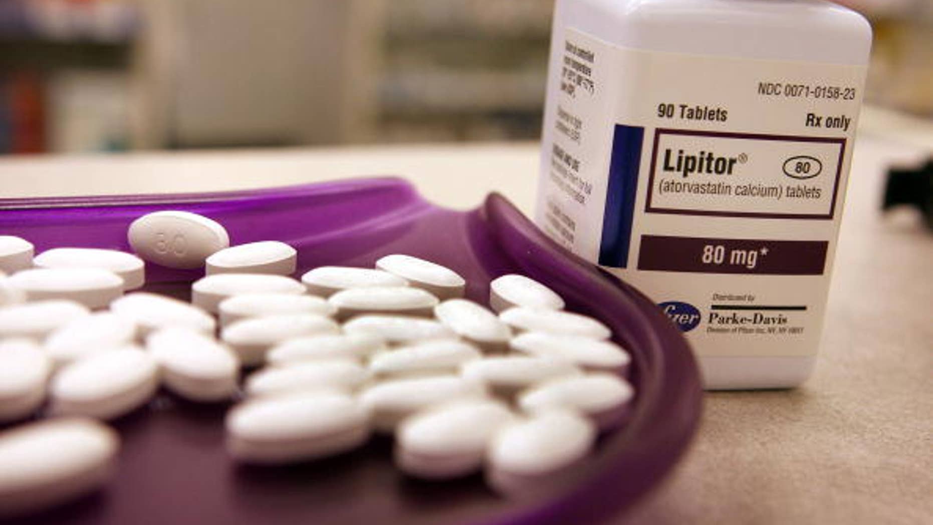 Lipitor tablets sit in a tray at a pharmacy in Chicago, Illinois.
