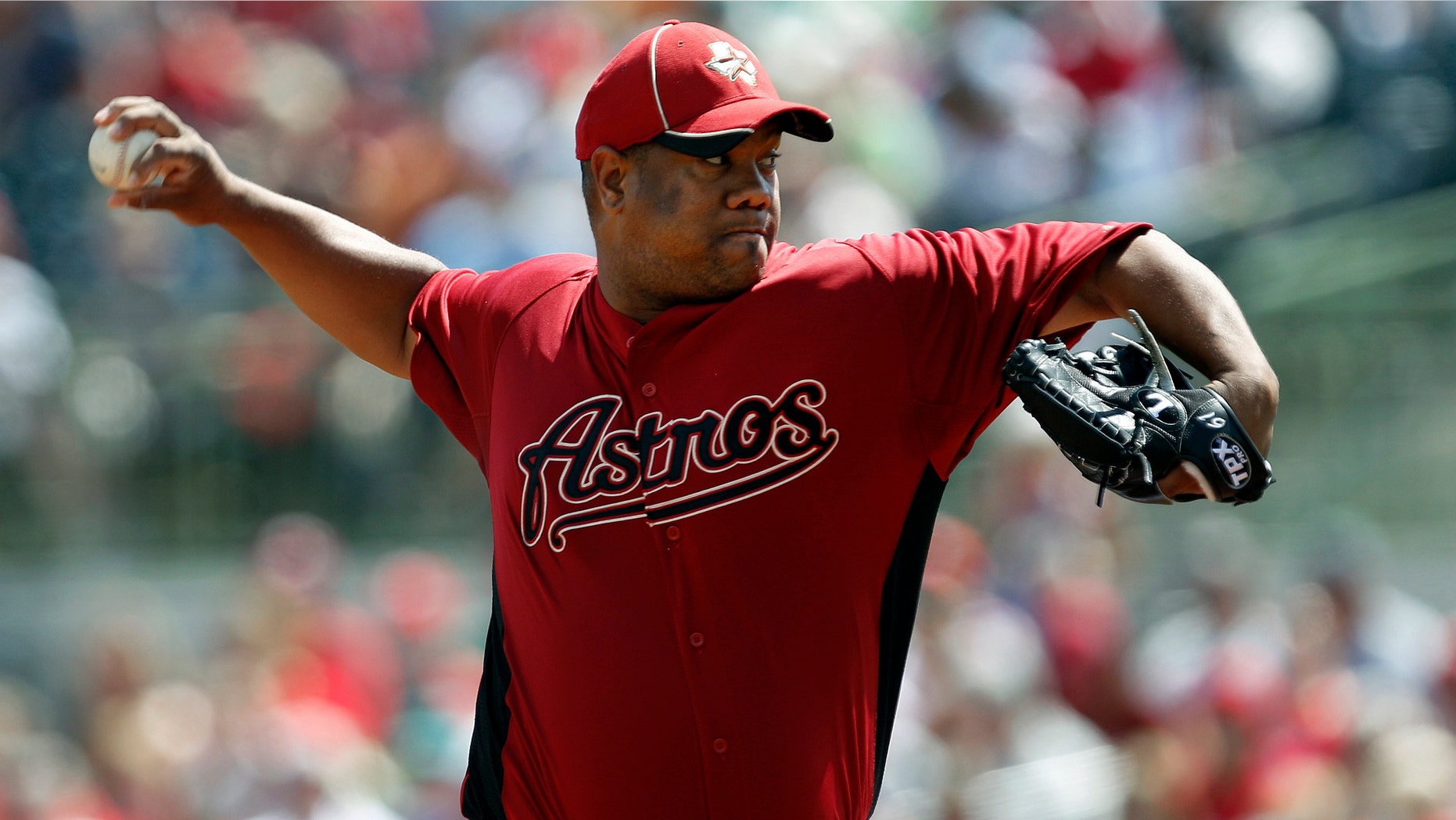 Houston Astros starting pitcher Livan Hernandez throws against the Philadelphia Phillies in the first inning of a spring training baseball game in Kissimmee, Fla., Tuesday, March 13, 2012. (AP Photo/Paul Sancya)