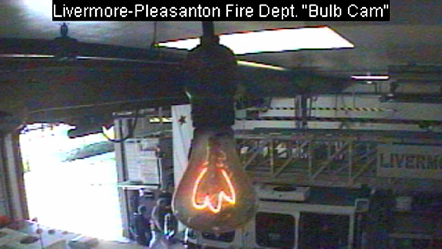 A frame from the Livermore-Pleasanton Dire Department's bulbcam shows the oldest lightbulb in the world, still glowing after all these years.