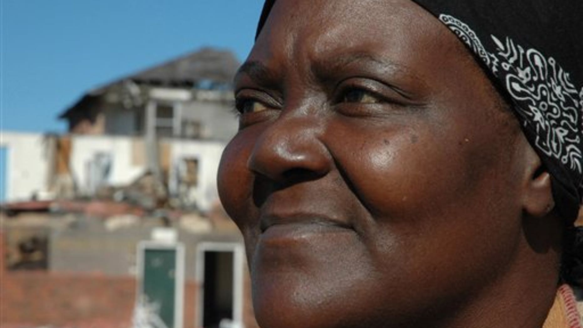 Jan. 3: Geraldine Horton, 53, pauses in tornado-ravaged Graceland Apartments in Tuscaloosa, Ala.