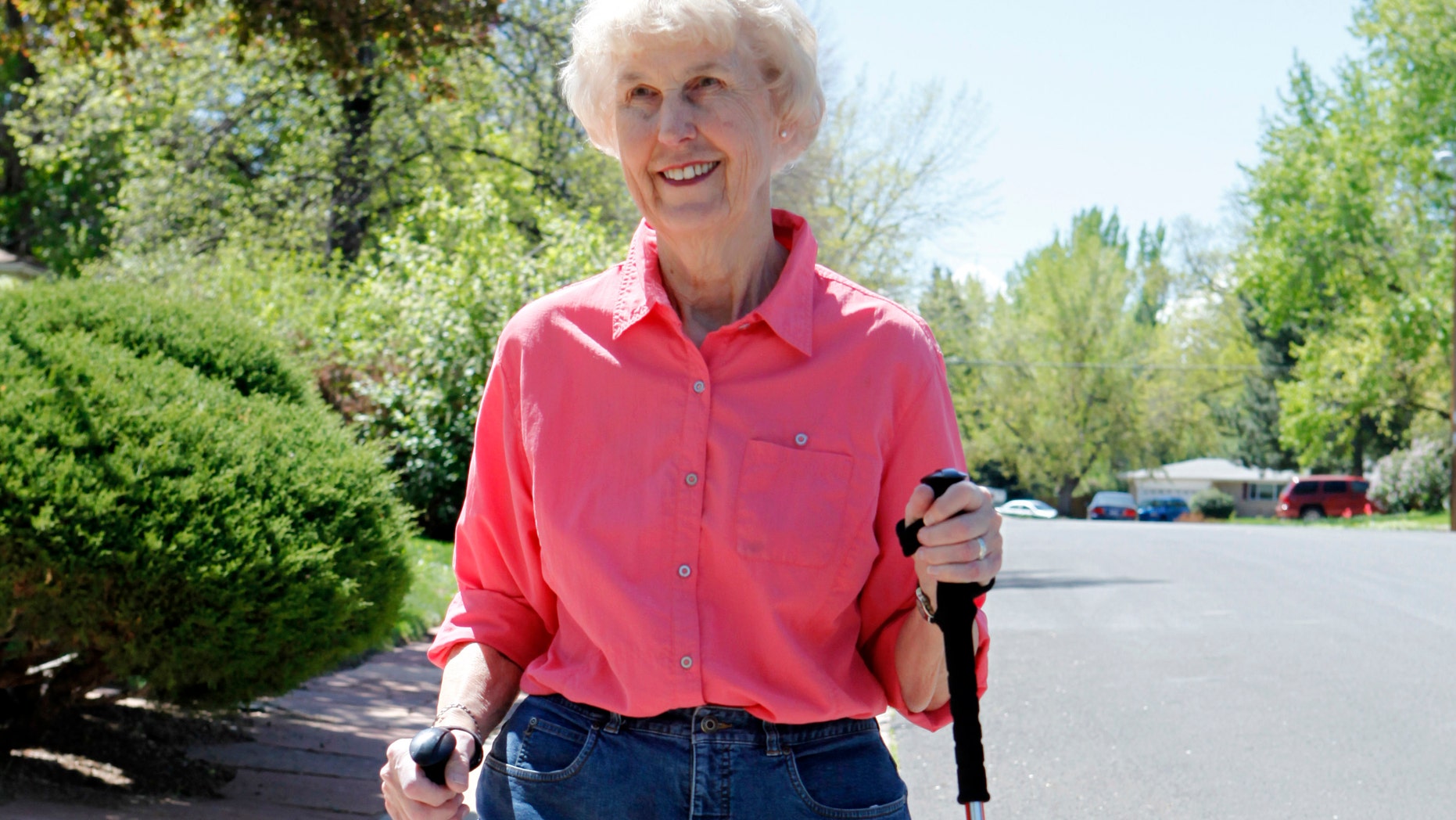 Elaine Vlieger, 79, is making some concessions to her early stage Alzheimer's, but isn't ready to give up either her home or her independence. (AP Photo/Ed Andrieski)