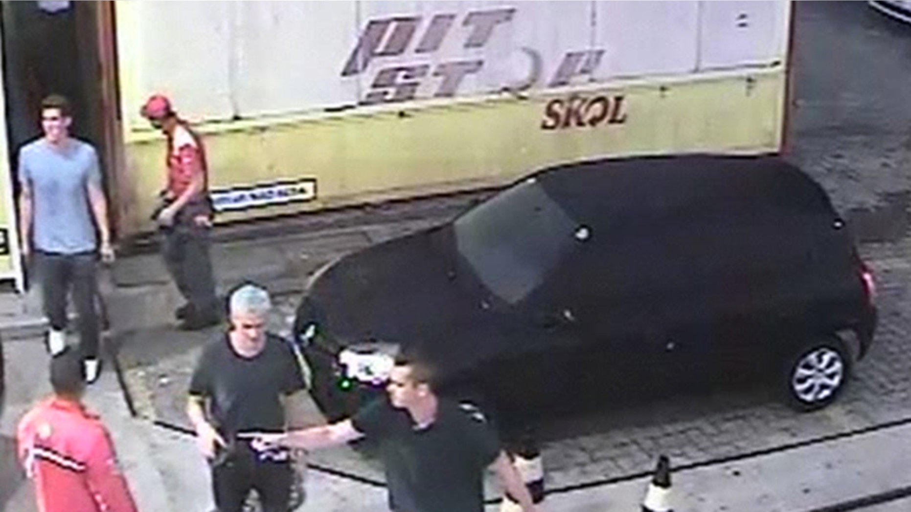 In this Sunday, Aug. 14, 2016 frame from surveillance video released by Brazil Police, swimmer Ryan Lochte, second from right, of the United States, and teammates, appear at a gas station during the 2016 Summer Olympics in Rio de Janeiro, Brazil. A top Brazil police official said the swimmers damaged property at the gas station. (Brazil Police via AP)