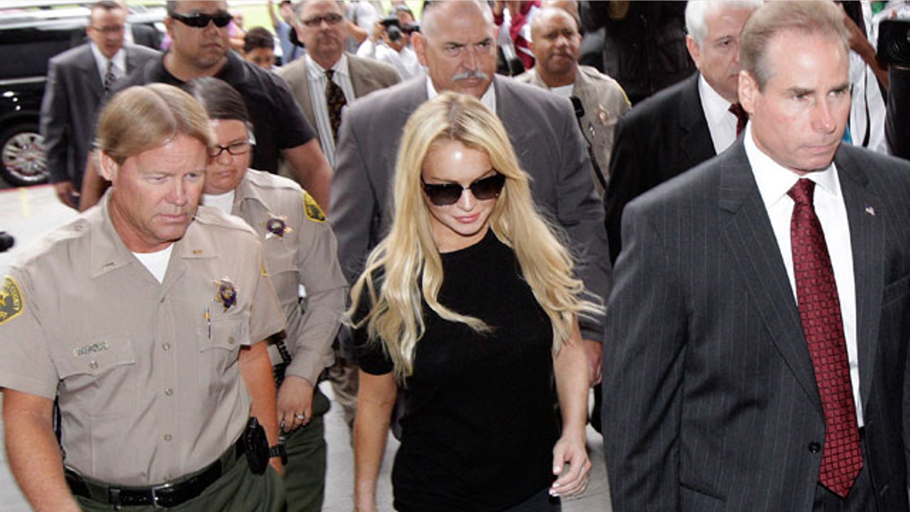 July 6: Lindsay Lohan arrives for a probation hearing in Los Angeles.