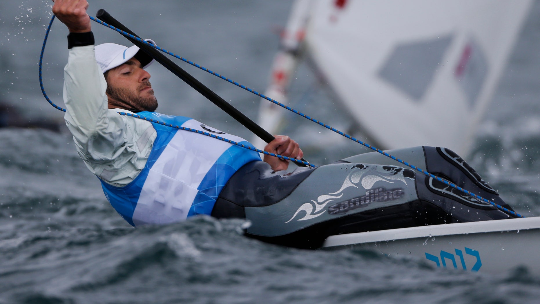 Cyprus' Pavlos Kontides competes during the laser class race at the London 2012 Summer Olympics, Saturday, Aug. 4, 2012, in Weymouth and Portland, England. (AP Photo/Bernat Armangue)