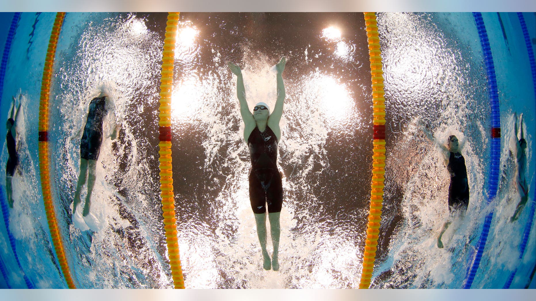 July 31, 2012: China's Ye Shiwen, center, competes in the women's 200-meter individual medley swimming final at the Aquatics Centre in the Olympic Park during the 2012 Summer Olympics in London.