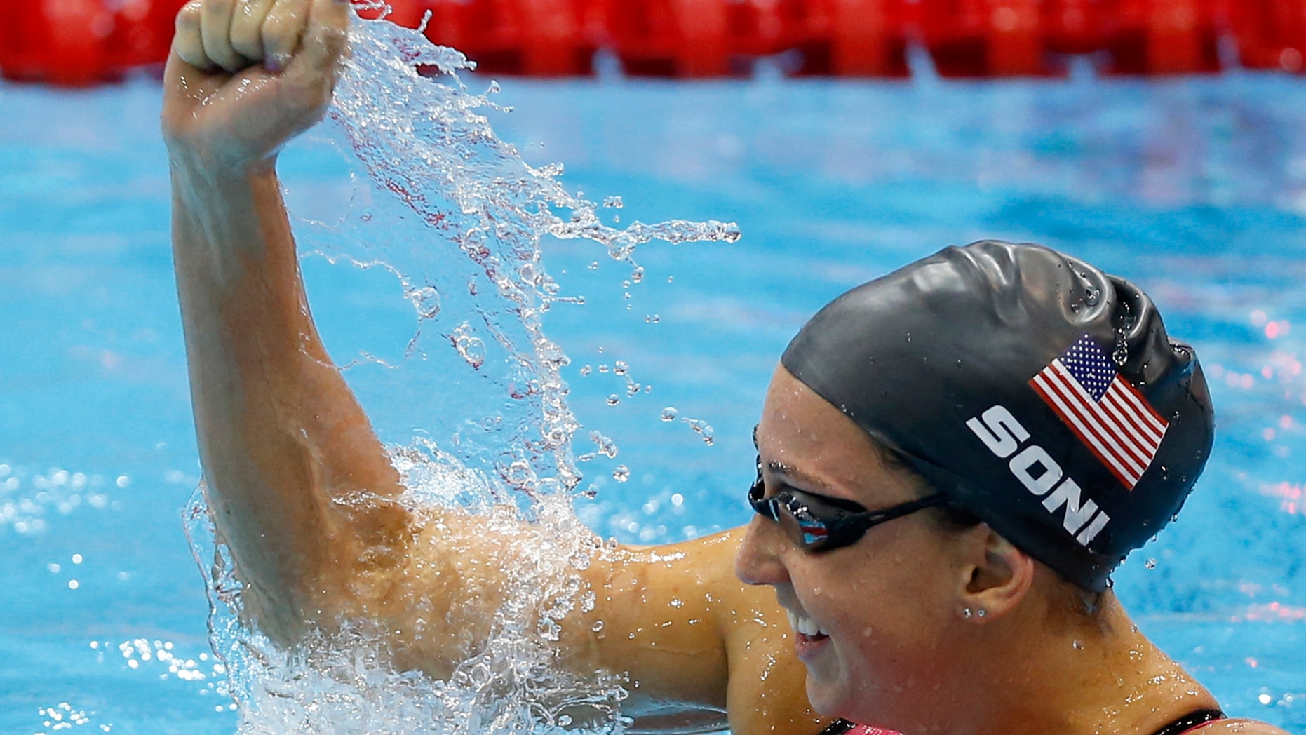 Aug. 2, 2012: United States' Rebecca Soni celebrates her gold medal win in the women's 200-meter breaststroke swimming final at the Aquatics Centre in the Olympic Park during the 2012 Summer Olympics in London.