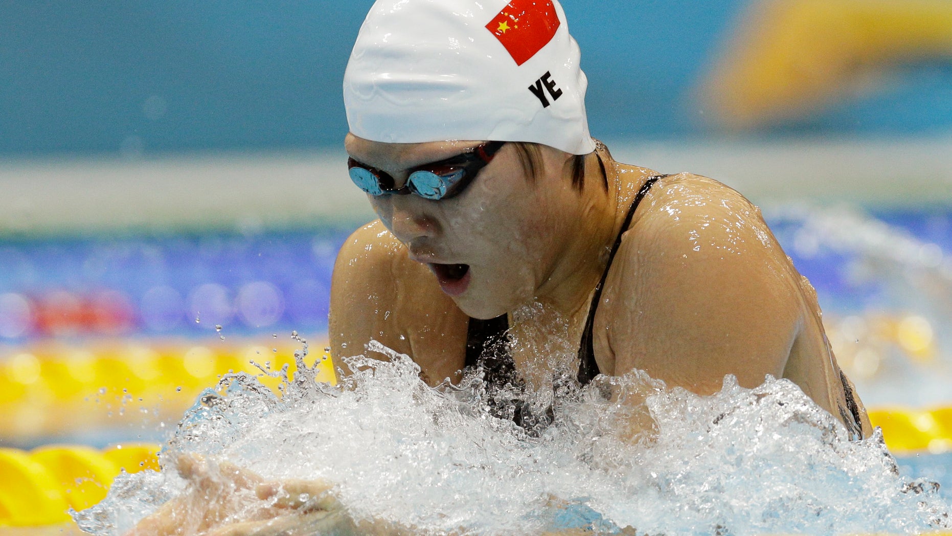 China's Ye Shiwen competes in a women's 200-meter individual medley swimming heat at the Aquatics Centre in the Olympic Park during the 2012 Summer Olympics in London, Monday, July 30, 2012. (AP Photo/Michael Sohn)