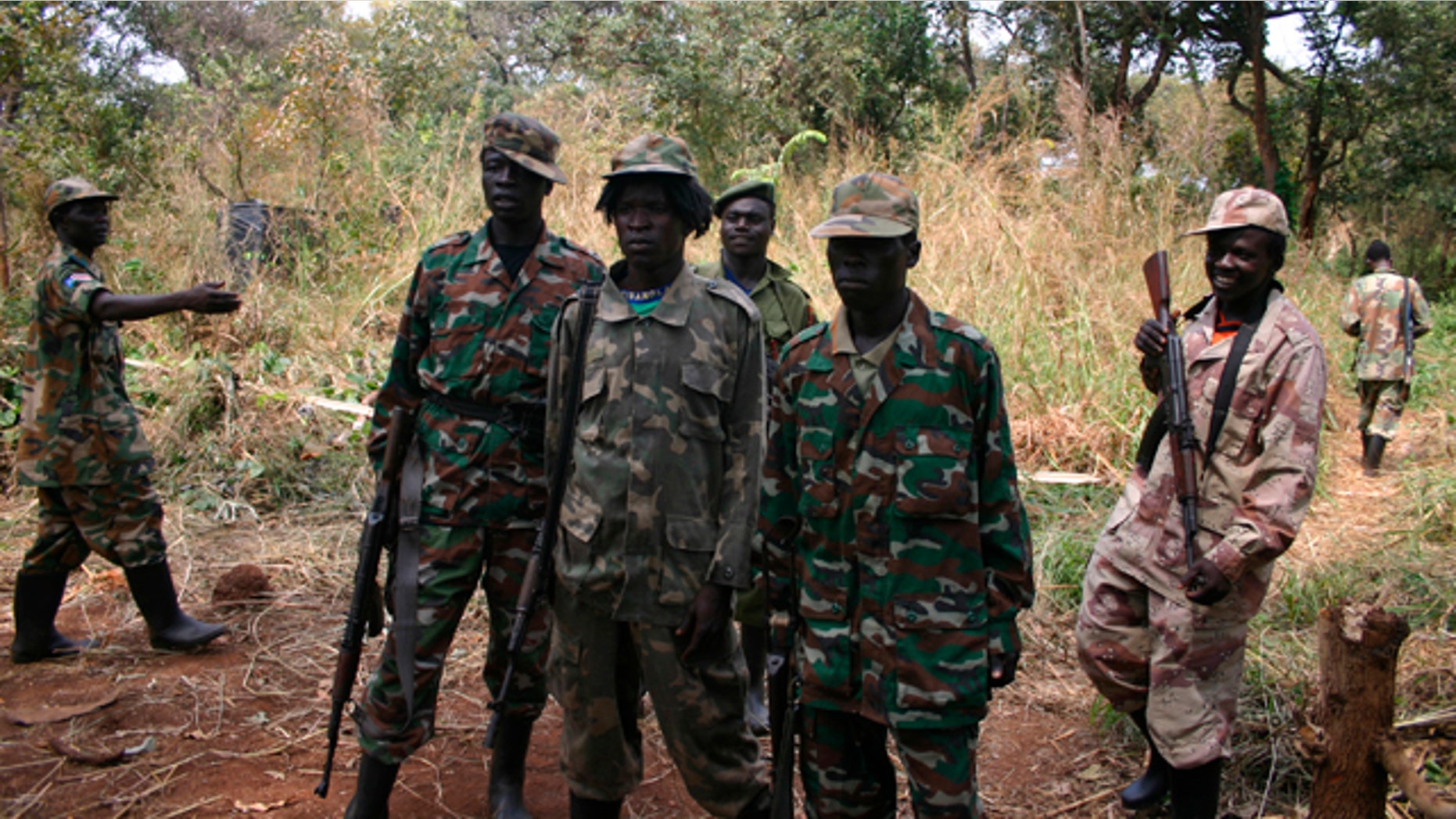 Lord's Resistance Army soldiers pose during peace negotiations between the LRA and Ugandan religious and cultural leaders in southern Sudan. (AP)