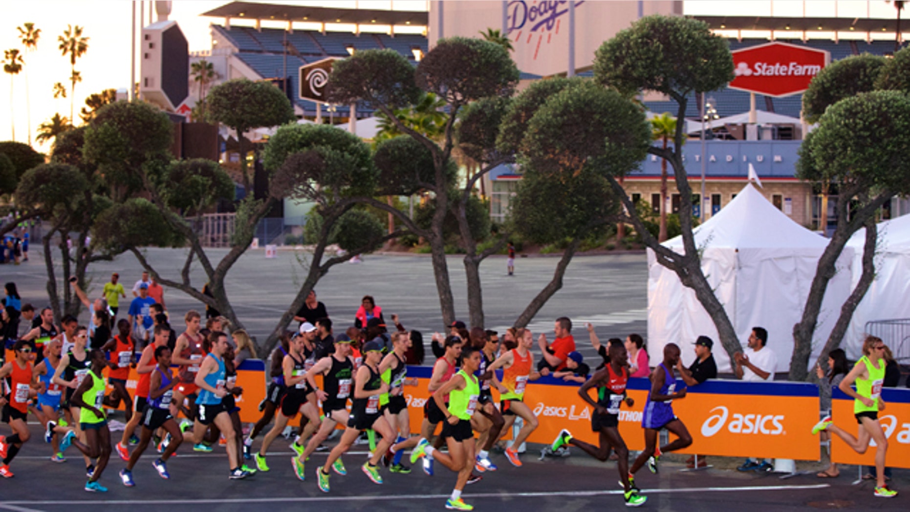 March 15, 2015: Men's elite runners start the 30th Los Angeles Marathon. The 26.2-mile event begins at Dodger Stadium and ends in Santa Monica, Calif. (AP Photo/Damian Dovarganes)