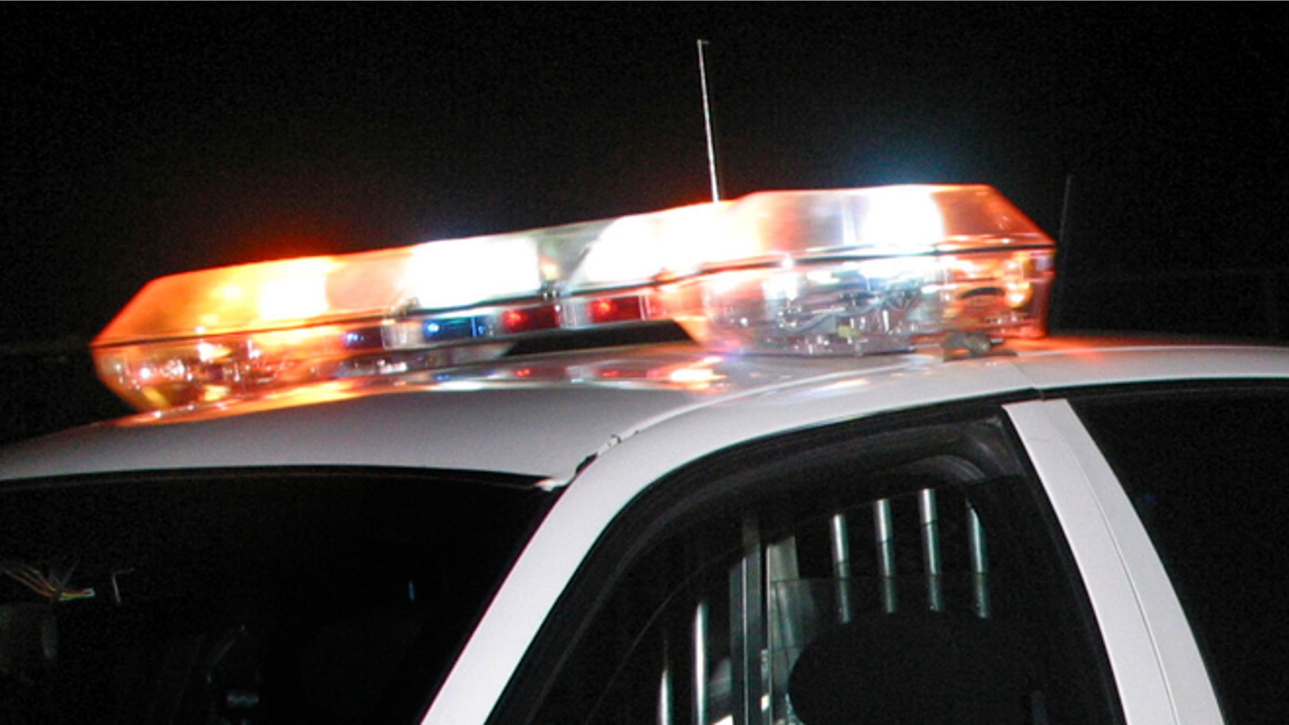 Police car with flashing lights in Shreveport, Louisiana. (Photo by Mario Villafuerte/Getty Images)