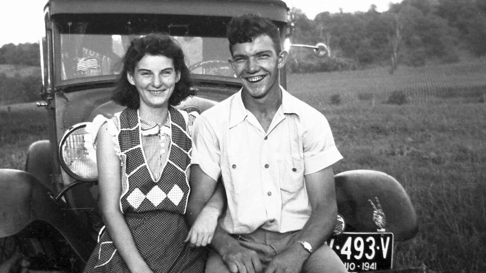 In this September 1941 photo provided by Dick Felumlee, Kenneth and Helen Felumlee pose for a photo nearly three years before their marriage in February 1944. The Felumlees, who celebrated their 70th wedding anniversary in February, died 15 hours apart from each other last week. (AP Photo/Felumlee family)