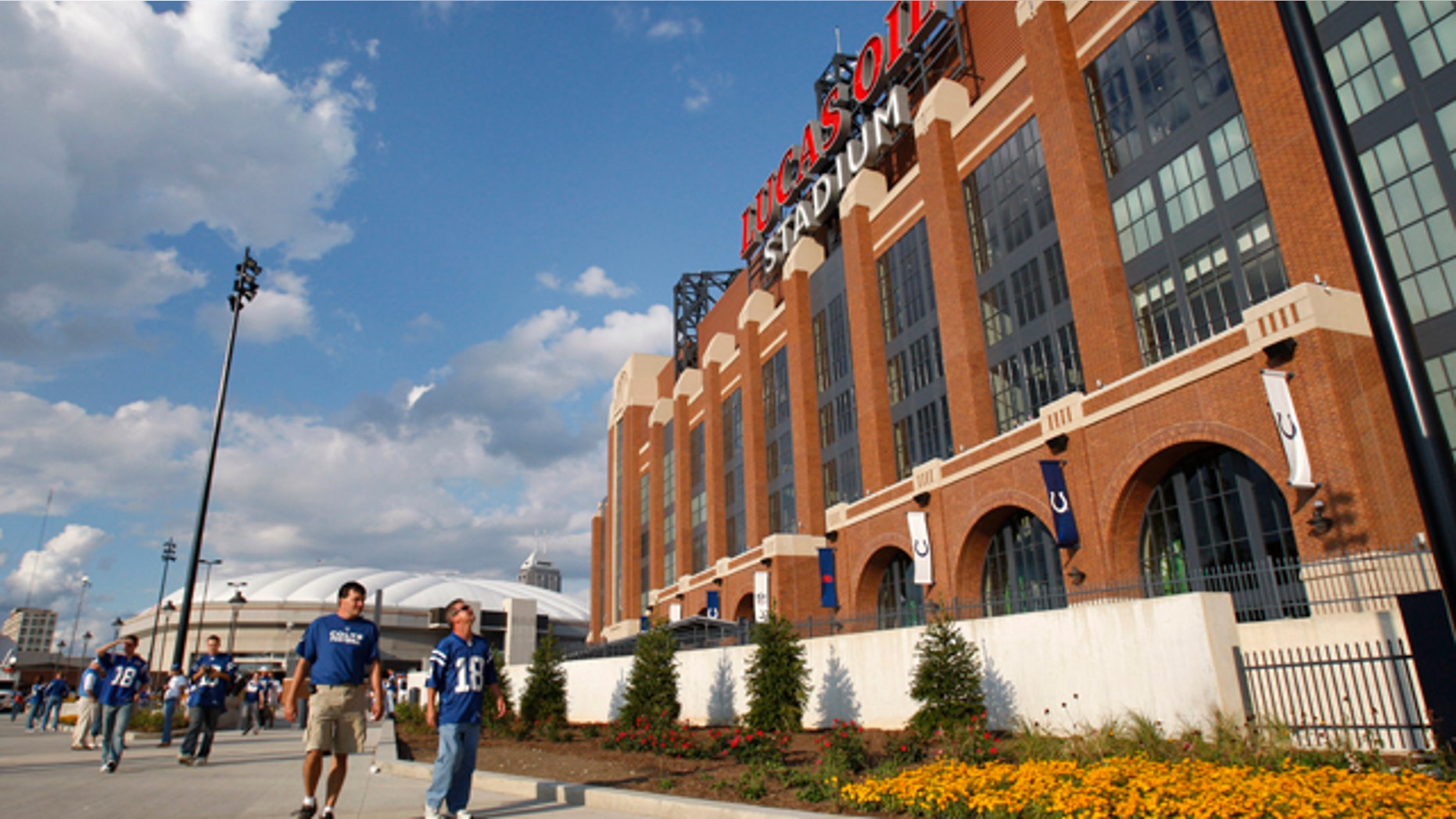 Sept. 7, 2008: Fans pass the new home of the Indianapolis Colts, Lucas Oils Stadium.