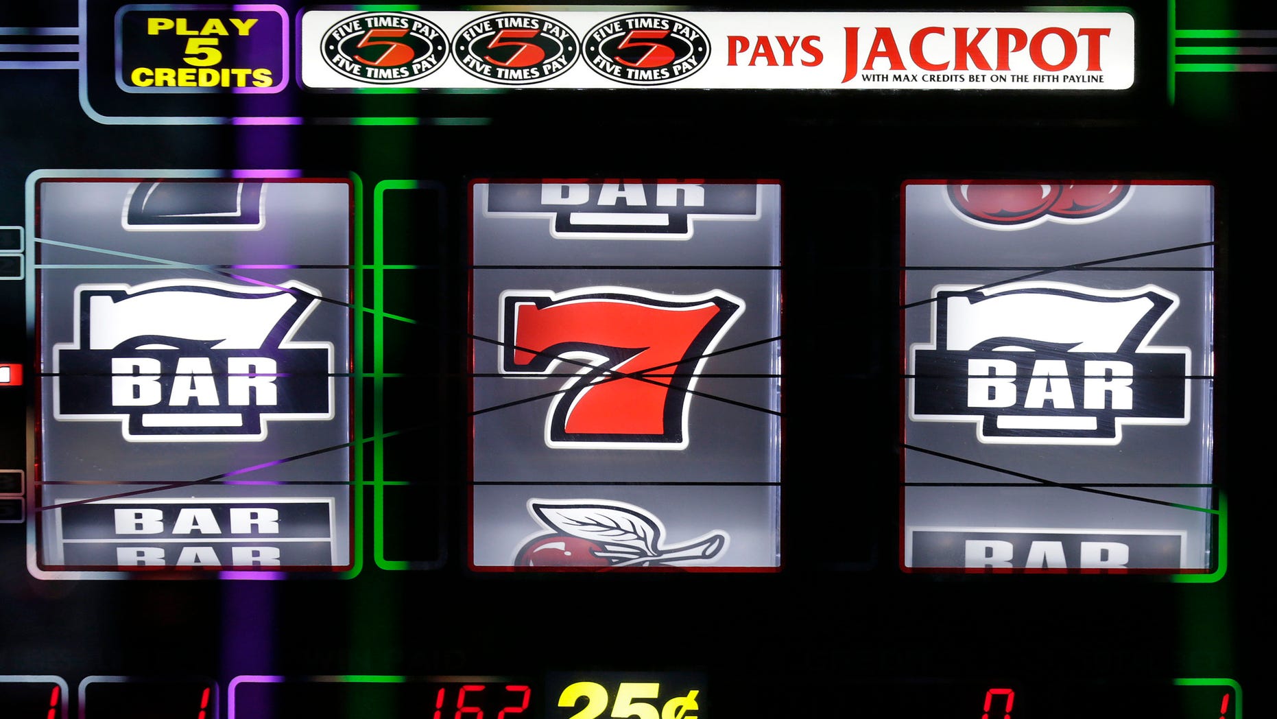 The display of a slot machine is seen in Plainville, Mass., June 23, 2015.