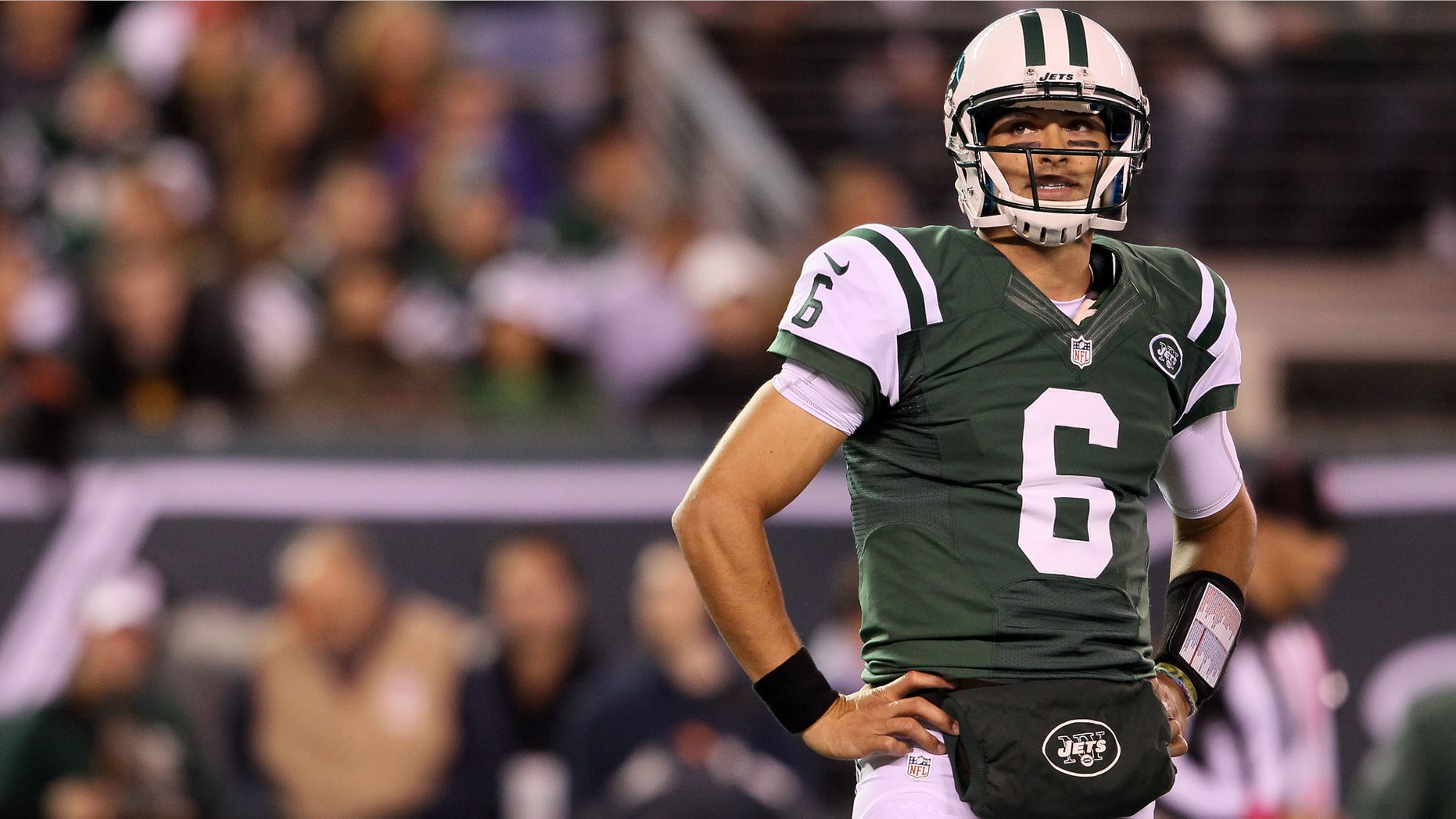 EAST RUTHERFORD, NJ - OCTOBER 08: Mark Sanchez #6 of the New York Jets looks on in the first half against the Houston Texans at MetLife Stadium on October 8, 2012 in East Rutherford, New Jersey. (Photo by Alex Trautwig/Getty Images)