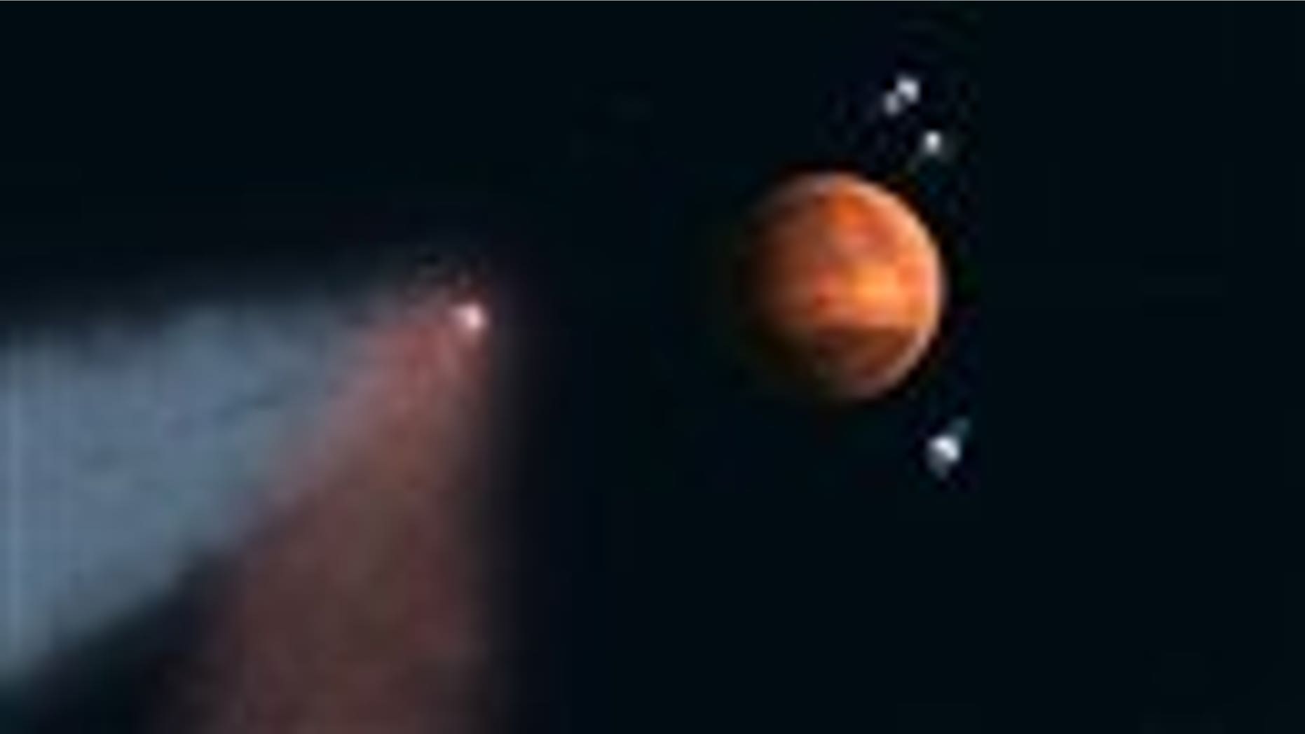 This handout artist's concept provided by NASA/JPL shows the Comet Siding Spring approaching Mars, shown with NASAs orbiters preparing to make science observations of this unique encounter. A pristine distant comet created a once-in-eight-million-year fireworks show on Mars and no humans were there to witness it. But new NASA data from satellites circling Mars released Friday shows that on Oct. 19 when Comet Siding Spring skimmed the red planet, tons of comet dust bombarded the Martian sky with thousands of fireballs an hour. It warped the Martian atmosphere leaving all sorts of metals and an eerie yellow afterglow. (AP Photo/NASA/JPL)