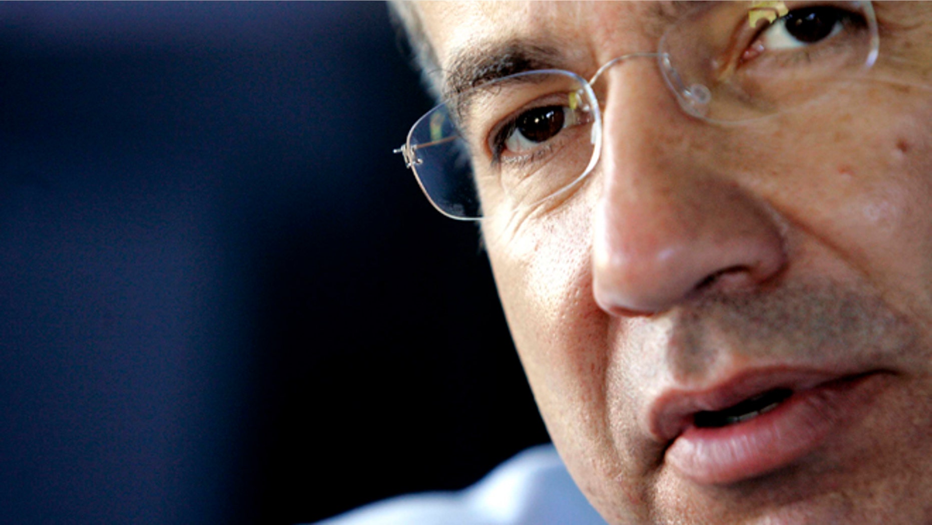 FILE - In this June 9, 2006 file photo, Mexican presidential candidate Felipe Calderon, of the National Action Party (PAN), speaks during an interview on his private bus after a campaign stop in San Jose del Rincon, Mexico. When Calderon came to power six years ago, he set goals to alleviate poverty, create jobs and increase public safety. As he winds up his term on Saturday, Dec. 1, 2102, Calderon leaves Mexico with fiscal stability that saved the country from collapse during the worldâs economic crisis, but with far greater violence, very little change in poverty levels and anemic job growth. (AP Photo/Gregory Bull, File)